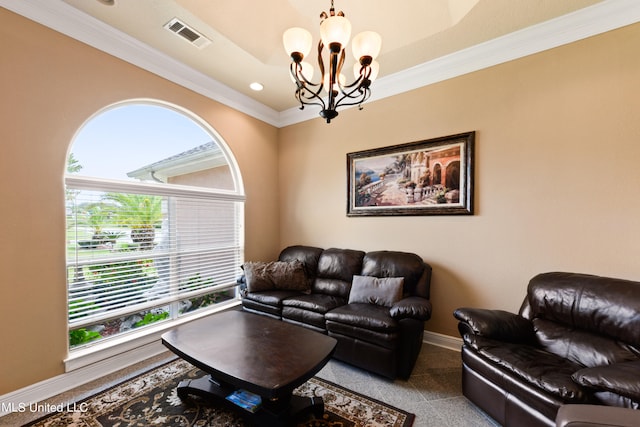 carpeted living room with ornamental molding and a chandelier