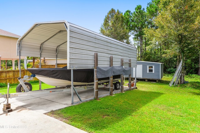 view of vehicle parking featuring a yard and a carport