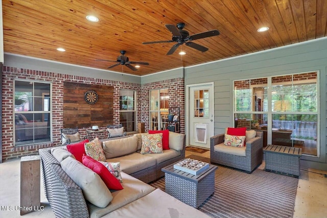 view of patio with an outdoor living space and ceiling fan