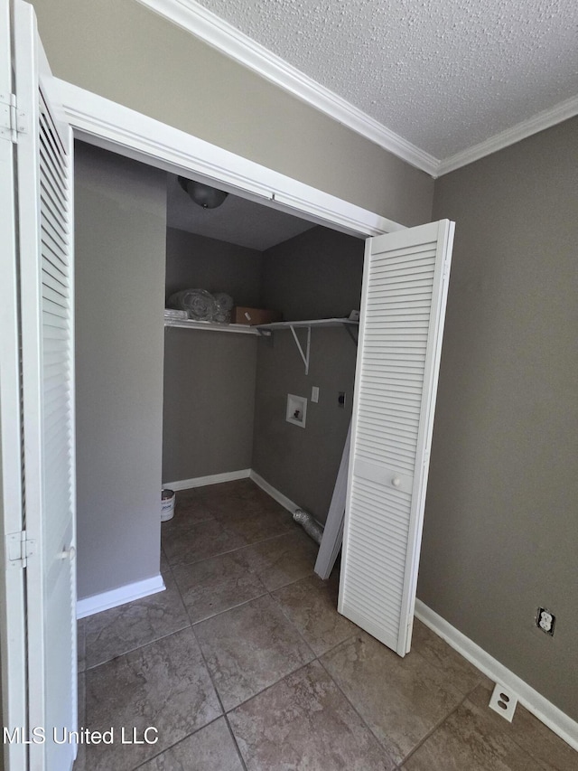 1442 Tally Ho Cir, Gulfport, MS 39507 - washroom with hookup for a washing machine, crown molding, and a textured ceiling