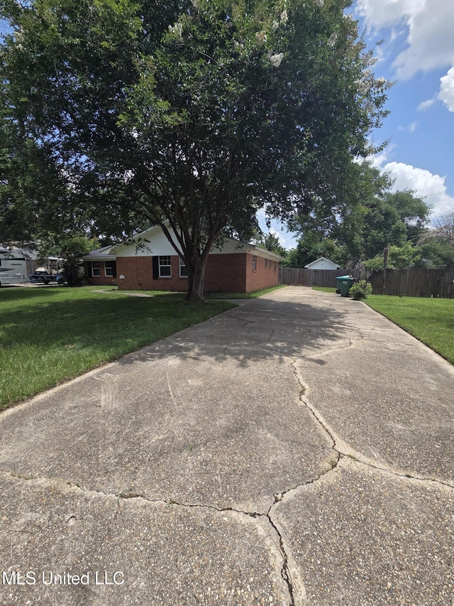 1442 Tally Ho Cir, Gulfport, MS 39507 - ranch-style house featuring driveway and brick siding