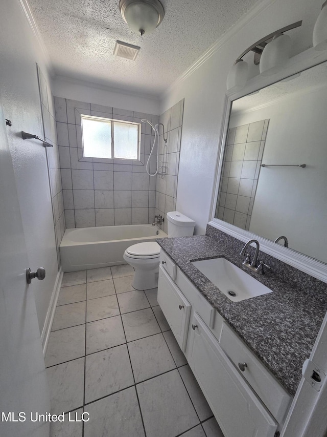 1442 Tally Ho Cir, Gulfport, MS 39507 - bathroom featuring a textured ceiling, vanity, crown molding, washtub / shower combination, and tile patterned flooring