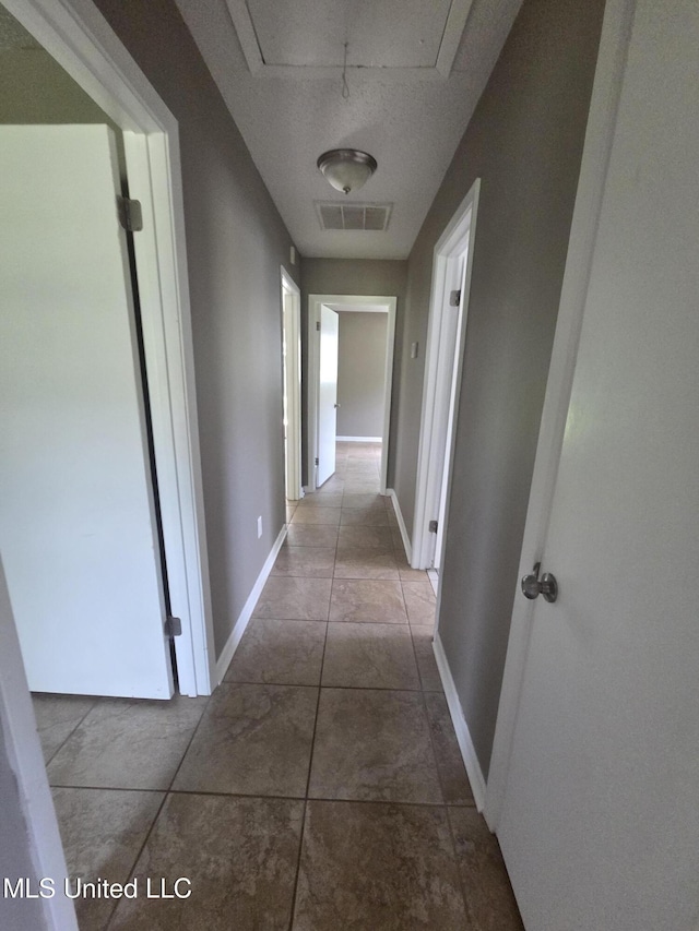 1442 Tally Ho Cir, Gulfport, MS 39507 - corridor with attic access and baseboards