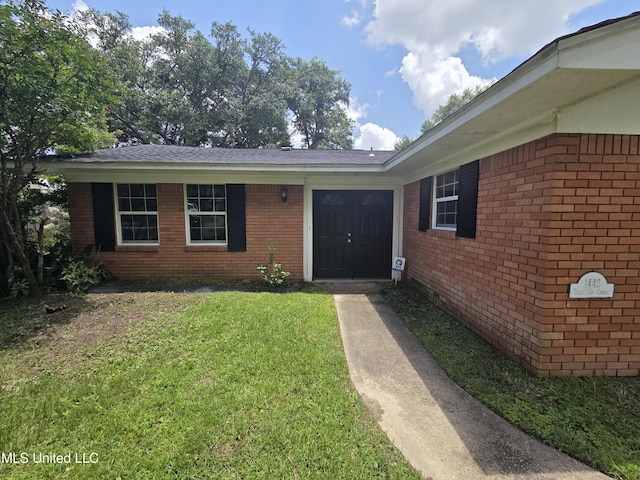 1442 Tally Ho Cir, Gulfport, MS 39507 - entrance to property with brick siding and a lawn