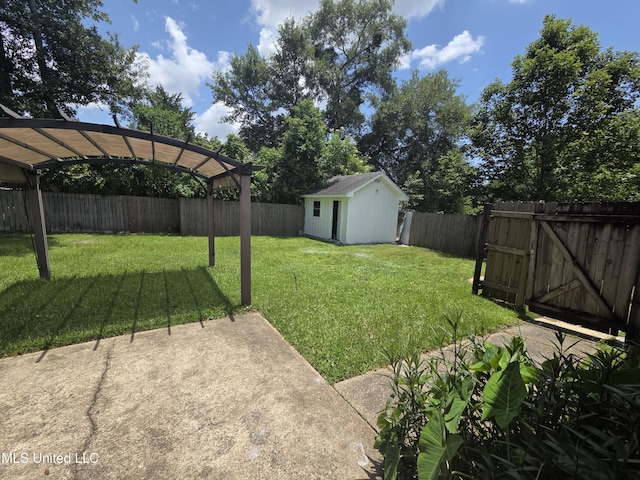 1442 Tally Ho Cir, Gulfport, MS 39507 - fenced backyard featuring a storage shed, a pergola, and a patio