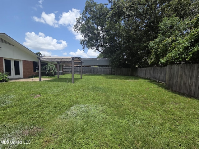 1442 Tally Ho Cir, Gulfport, MS 39507 - fenced backyard featuring a pergola and french doors