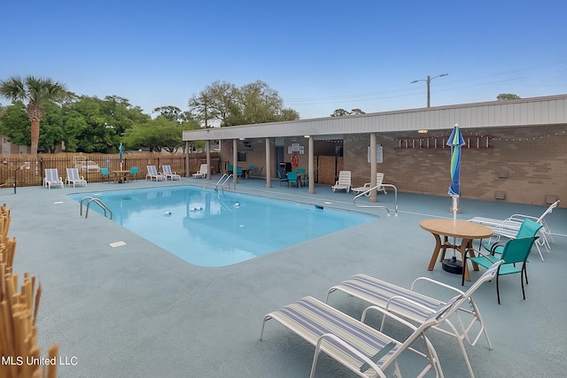 view of pool with a patio area