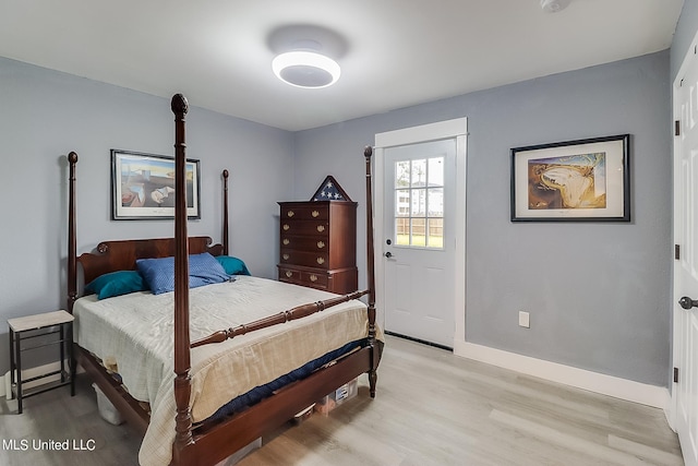 bedroom with light hardwood / wood-style flooring