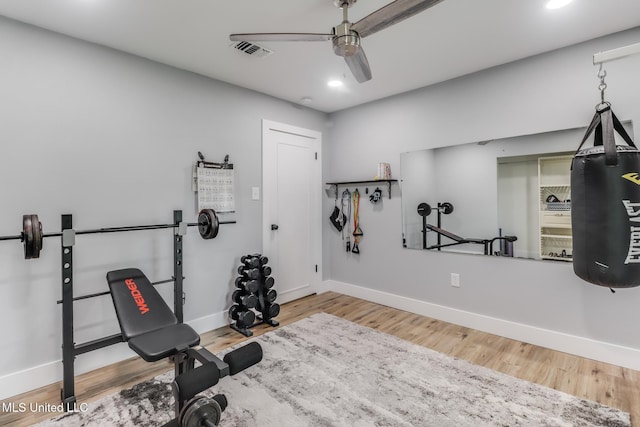 8707 Pine Ridge Ct, Diamondhead, MS 39525 - workout area featuring a ceiling fan, recessed lighting, and wood finished floors