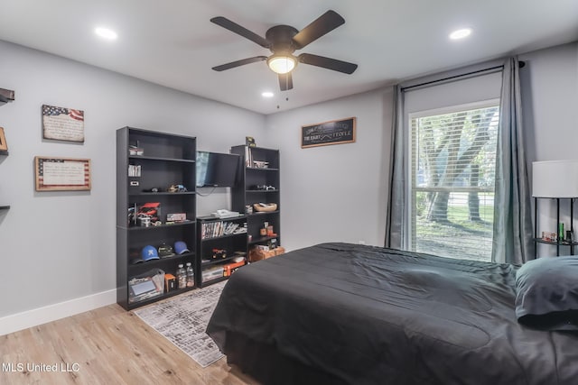 8707 Pine Ridge Ct, Diamondhead, MS 39525 - bedroom featuring light wood-style floors, recessed lighting, and a ceiling fan