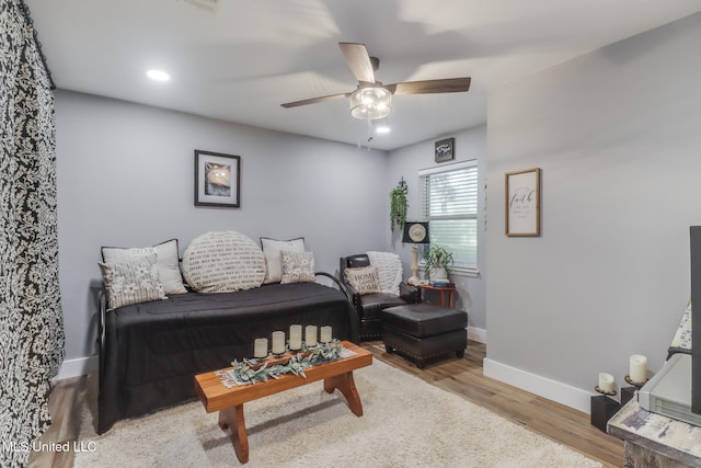 8707 Pine Ridge Ct, Diamondhead, MS 39525 - living room with a ceiling fan, wood finished floors, and recessed lighting