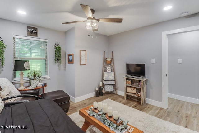 8707 Pine Ridge Ct, Diamondhead, MS 39525 - living area with a ceiling fan, wood finished floors, and recessed lighting