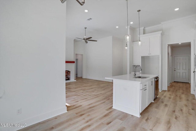 165 Cornerstone Dr, Brandon, MS 39042 - kitchen with a sink, white cabinetry, stainless steel dishwasher, visible vents, and ornamental molding