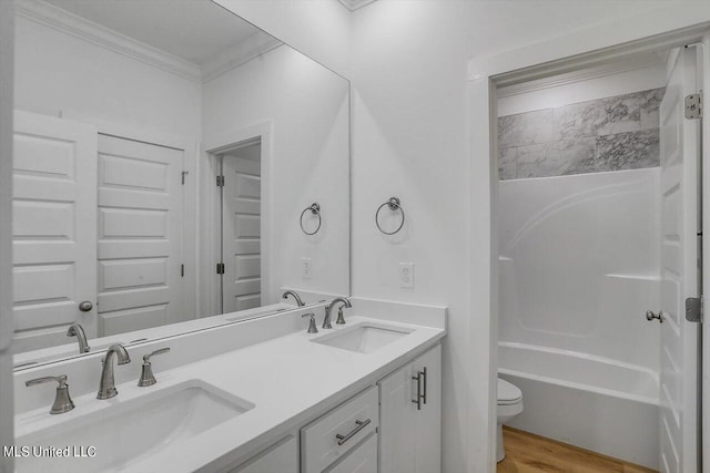 165 Cornerstone Dr, Brandon, MS 39042 - full bath with double vanity, a sink, toilet, and ornamental molding