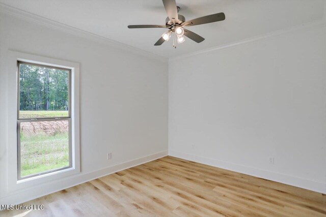 empty room with ceiling fan, light wood-type flooring, and crown molding