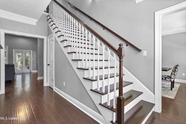 staircase with baseboards, french doors, hardwood / wood-style floors, and crown molding