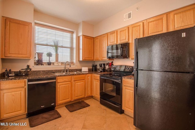 2230 Beach Dr Unit 808, Gulfport, MS 39507 - kitchen with a sink, dark stone countertops, light tile patterned floors, visible vents, and black appliances