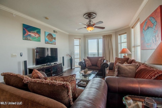 2230 Beach Dr Unit 808, Gulfport, MS 39507 - living area featuring crown molding, visible vents, wood finished floors, baseboards, and ceiling fan