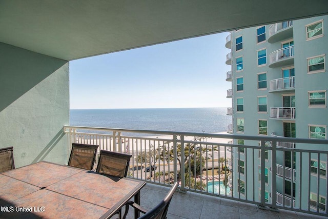 2230 Beach Dr Unit 808, Gulfport, MS 39507 - balcony with outdoor dining space and a water view