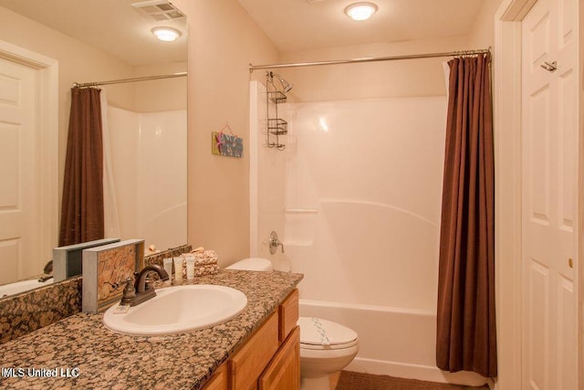 2230 Beach Dr Unit 808, Gulfport, MS 39507 - full bathroom with vanity, shower / bath combination with curtain, toilet, and visible vents