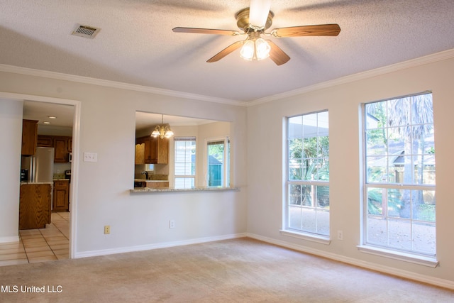 unfurnished living room featuring light carpet, a textured ceiling, ceiling fan with notable chandelier, and ornamental molding