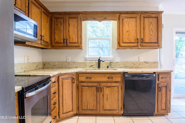 kitchen with crown molding, light tile patterned flooring, sink, and stainless steel appliances