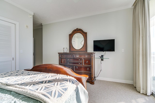 bedroom featuring light colored carpet, baseboards, and ornamental molding