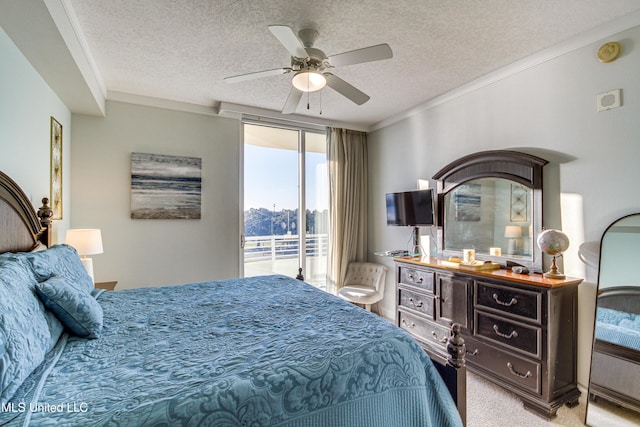 carpeted bedroom featuring ceiling fan, a textured ceiling, access to exterior, and crown molding