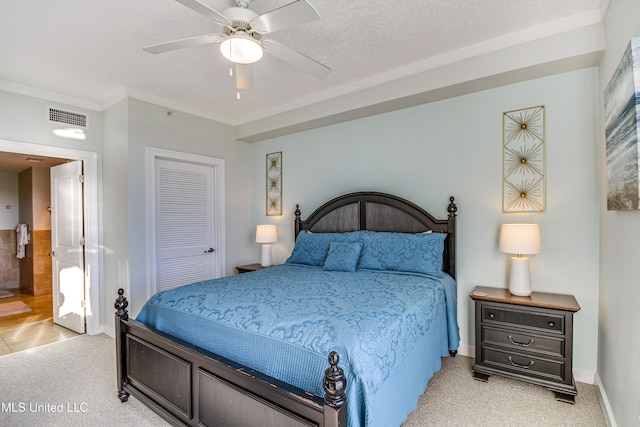 bedroom with light carpet, visible vents, crown molding, and a closet