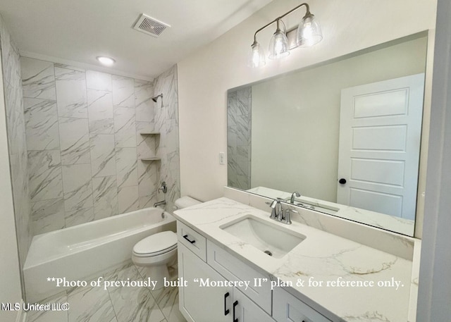 full bathroom with tiled shower / bath, vanity, and toilet