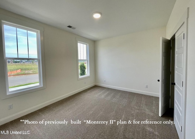 view of carpeted empty room