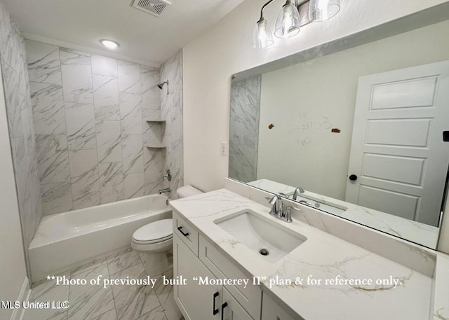 full bathroom with vanity, toilet, and tiled shower / bath combo