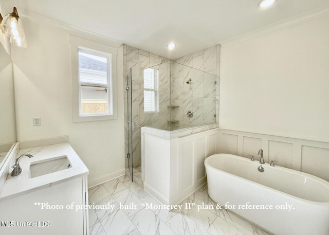 bathroom with vanity and separate shower and tub