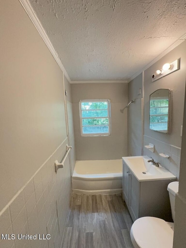 full bath featuring toilet, shower / tub combination, ornamental molding, and wood finished floors