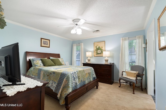 453 Cherry Tree Ln, Southaven, MS 38671 - bedroom featuring multiple windows, light colored carpet, ornamental molding, ceiling fan, and a textured ceiling