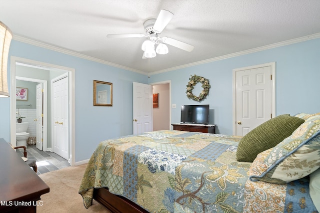 453 Cherry Tree Ln, Southaven, MS 38671 - bedroom featuring ornamental molding, a ceiling fan, ensuite bath, and baseboards