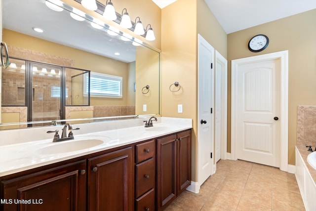 bathroom featuring tile patterned flooring, vanity, and independent shower and bath