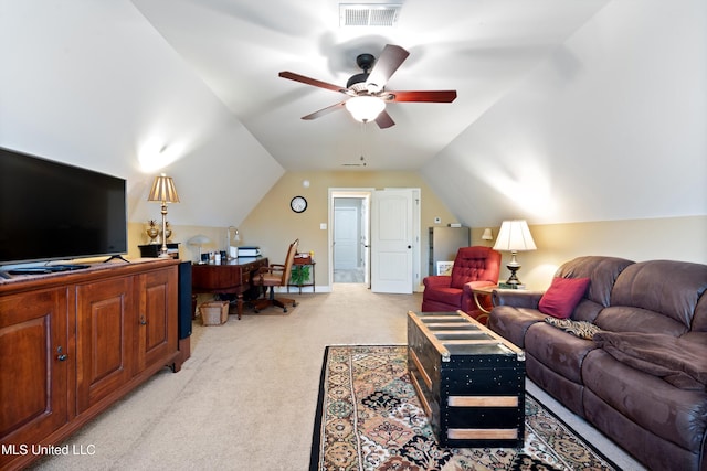 carpeted living room featuring ceiling fan and vaulted ceiling