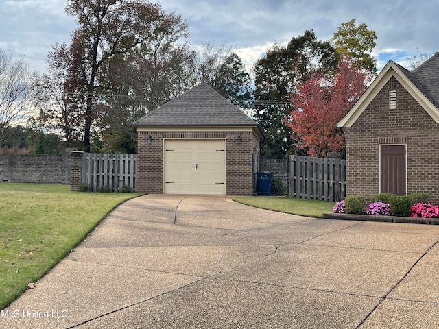 garage with a lawn