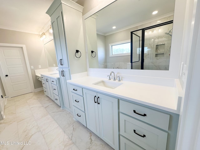 bathroom with marble finish floor, crown molding, two vanities, and a sink