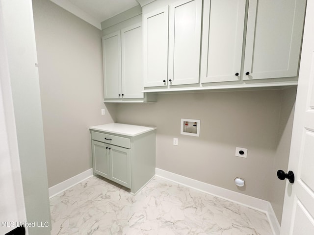 laundry area featuring cabinet space, baseboards, marble finish floor, washer hookup, and electric dryer hookup