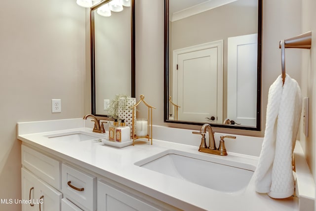 bathroom with a sink and double vanity