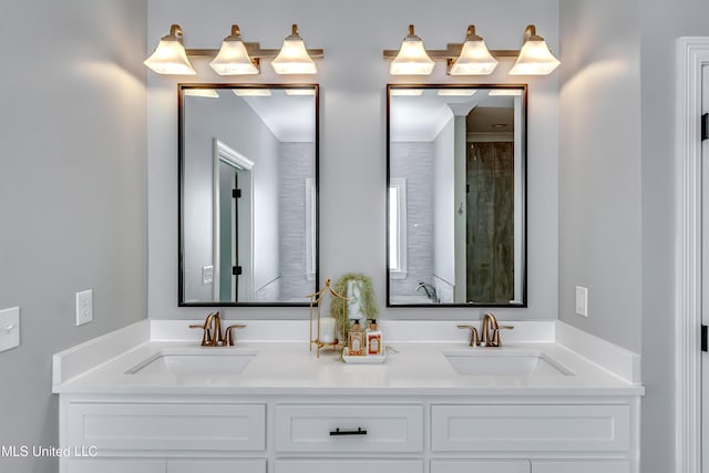 full bath with double vanity and a sink