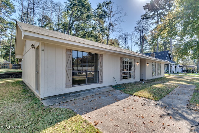 exterior space featuring a yard