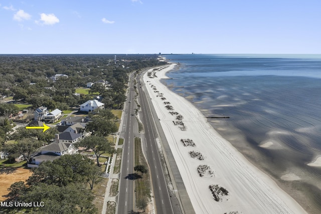 bird's eye view featuring a view of the beach and a water view