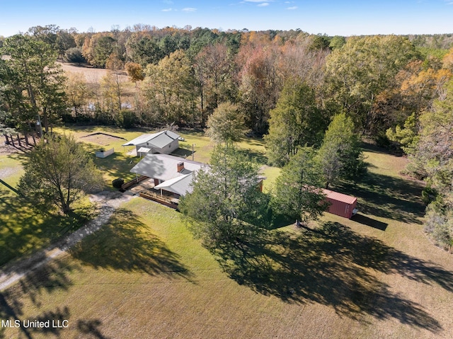 birds eye view of property with a rural view