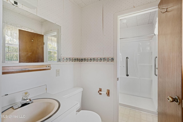 bathroom featuring walk in shower, vanity, and toilet