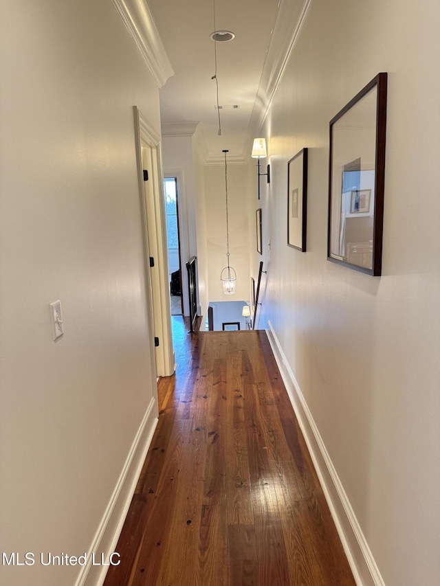 202 Eastpark St, Ridgeland, MS 39157 - hallway featuring ornamental molding, dark wood-style floors, and baseboards
