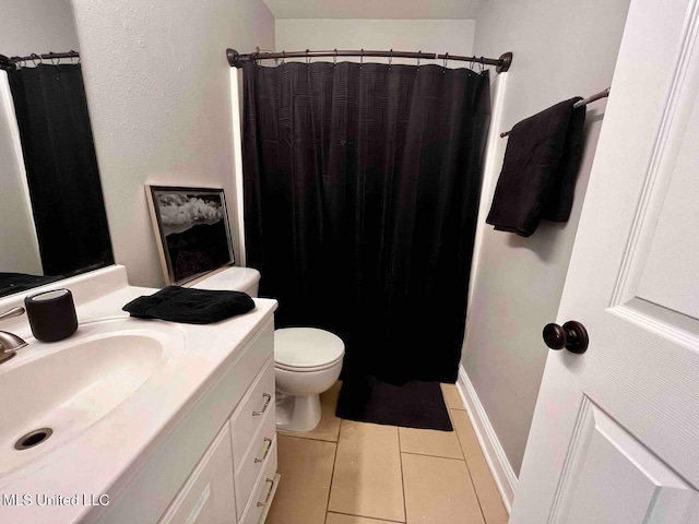 2290 Monica Dr, Gulfport, MS 39507 - bathroom with vanity, tile patterned flooring, toilet, and curtained shower