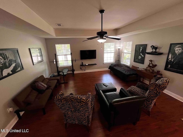 2290 Monica Dr, Gulfport, MS 39507 - living area with plenty of natural light, wood finished floors, baseboards, and ceiling fan